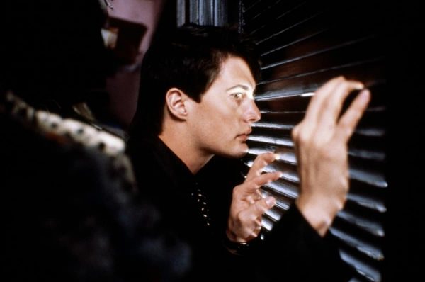 Kyle MacLaughlan hides in a coat closet in Blue Velvet (1986)