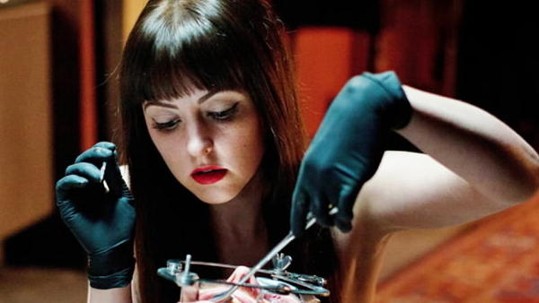 Katherine Isabelle doing surgery in American Mary (2012)