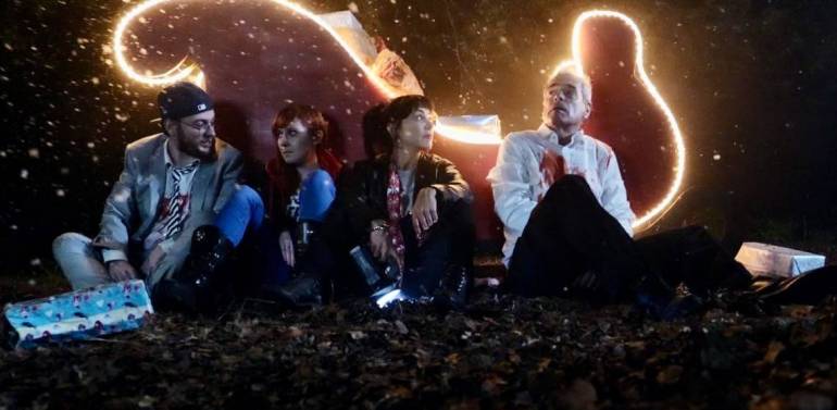 Rupert, Lucy, Carol, and Charlie in Werewolf Santa.