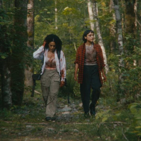 A Safe Distance (2026): SXSW Review - Two women walking through a dense forest, exploring themes of.