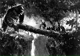 A mysterious creature lurking on a fallen tree over a waterfall in a dense jungle.