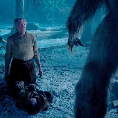 A terrifying encounter with a large, menacing creature in a dark, eerie forest scene.