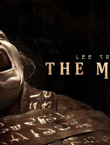 Scary mummy with hieroglyphs on bandages from Lee Cronin's The Mummy review.