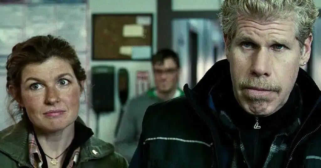 Close-up of two characters with serious expressions in a hospital setting.