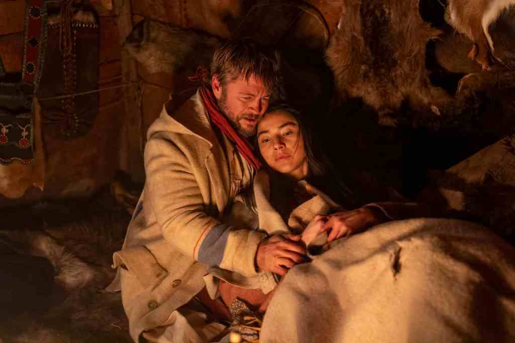 Intense scene from Ithaqua with distressed characters in a rustic setting.