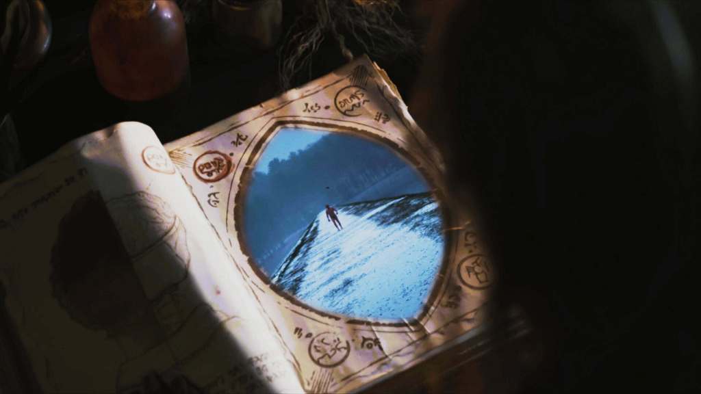 A person looking into a mystical, glowing mirror with a snowy landscape reflection.